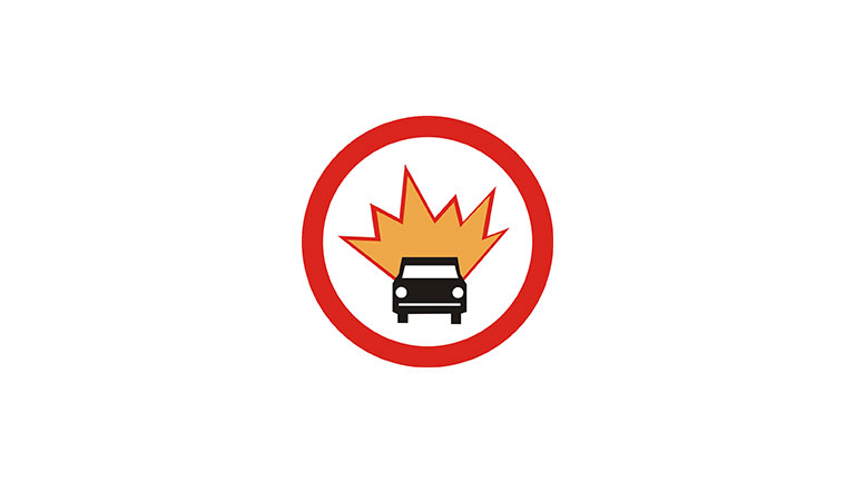 Znak B-13. Zakaz wjazdu pojazdów z towarami wybuchowymi lub łatwo zapalnymi