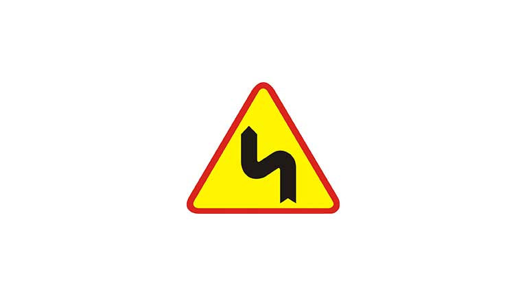 Znak A-4. Niebezpieczne zakręty – pierwszy w lewo