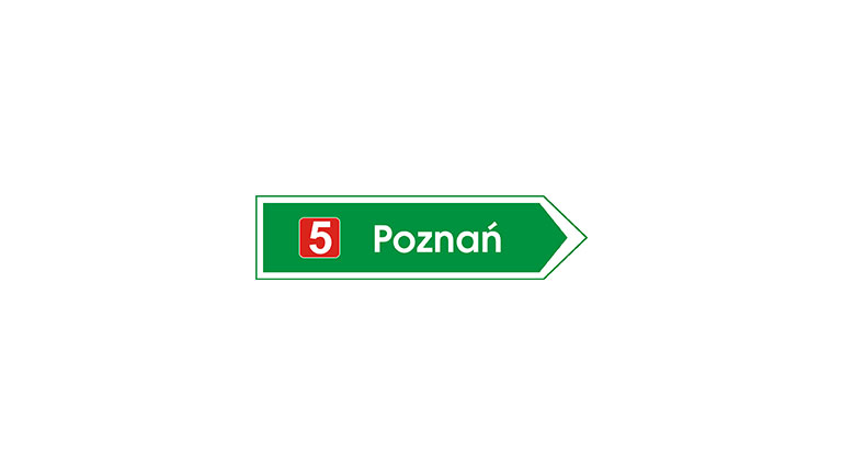 Znak E-3. Drogowskaz w kształcie strzały do miejscowości wskazujący numer drogi